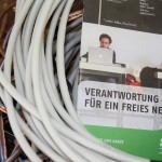 Kabel mit grünem Flyer - Prism, Digitalisierung